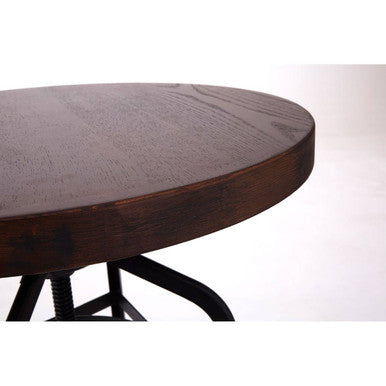 Dark brown wooden round new foundry walnut bar table with smooth surface and sturdy black metal bar legs