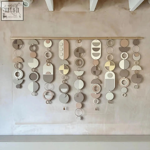 Modern wall art with geometric shapes in beige taupe cream and soft gold tones for stylish home decor