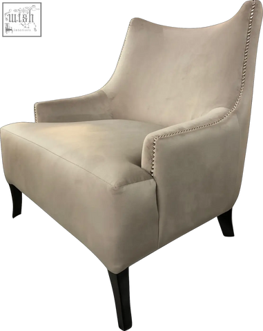 Beige velvet york arm chair with silver nailhead trim and dark wooden legs for stylish living spaces