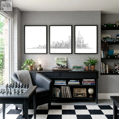 Black leather armchair with zigzag throw blanket in a games room featuring york posters minimalist skyline wall art