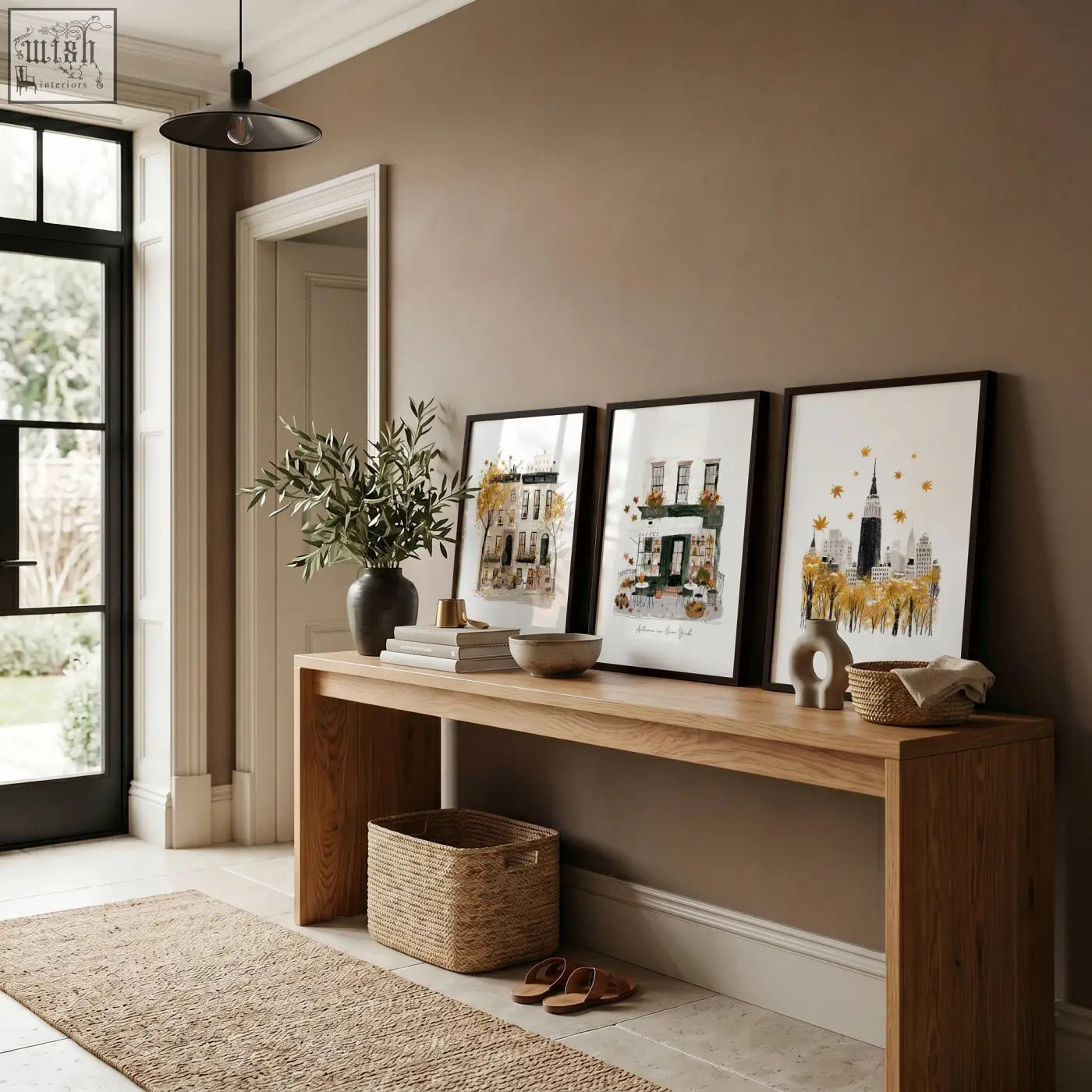 A sleek light oak wooden console table with clean lines complements new york travel wall art set autumn city prints