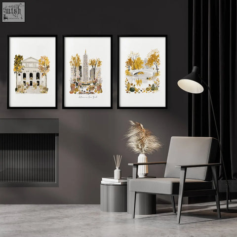 Three framed new york wall art canvas prints with autumn watercolor landmarks and golden foliage on dark wall