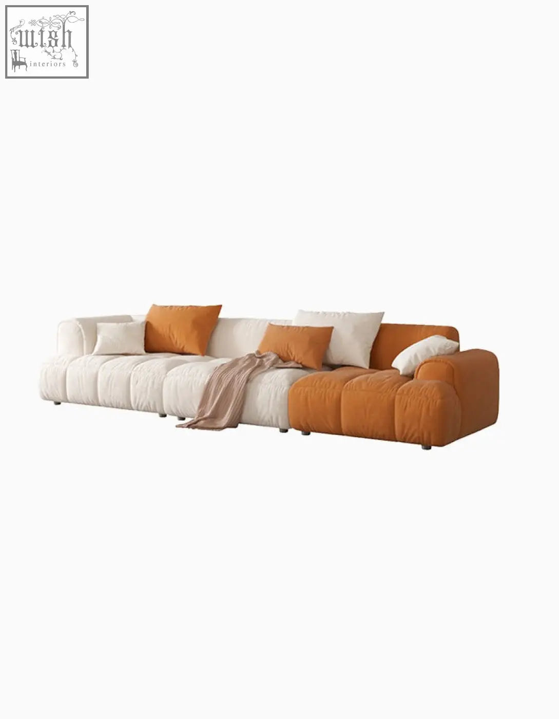 Newbury modern three seater sofa with plush velvet cream and burnt orange fabric and matching throw pillows