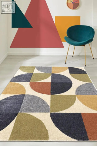 Modern geometric rug with bold circular patterns in navy olive green mustard yellow and cream from newport geometric rug