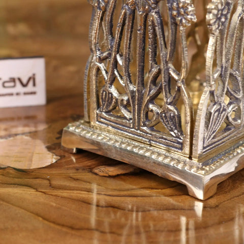 Silver-toned metal toast rack with intricate floral and scrollwork detailing for luxury desk accessories set