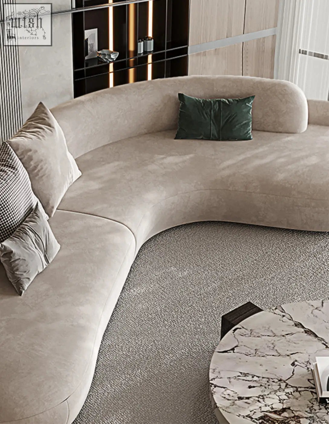 Beige nicosia grey curved three seater sofa with plush velvet upholstery and a dark green cushion