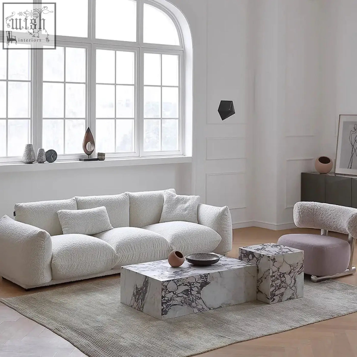 White plush nimbus sofa with luxurious fabric, soft textured upholstery, and rounded armrests in contemporary lines