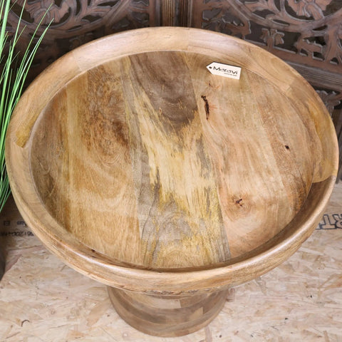 Niva large side table with round light brown mango wood top and pedestal base showing natural wood grain and knots