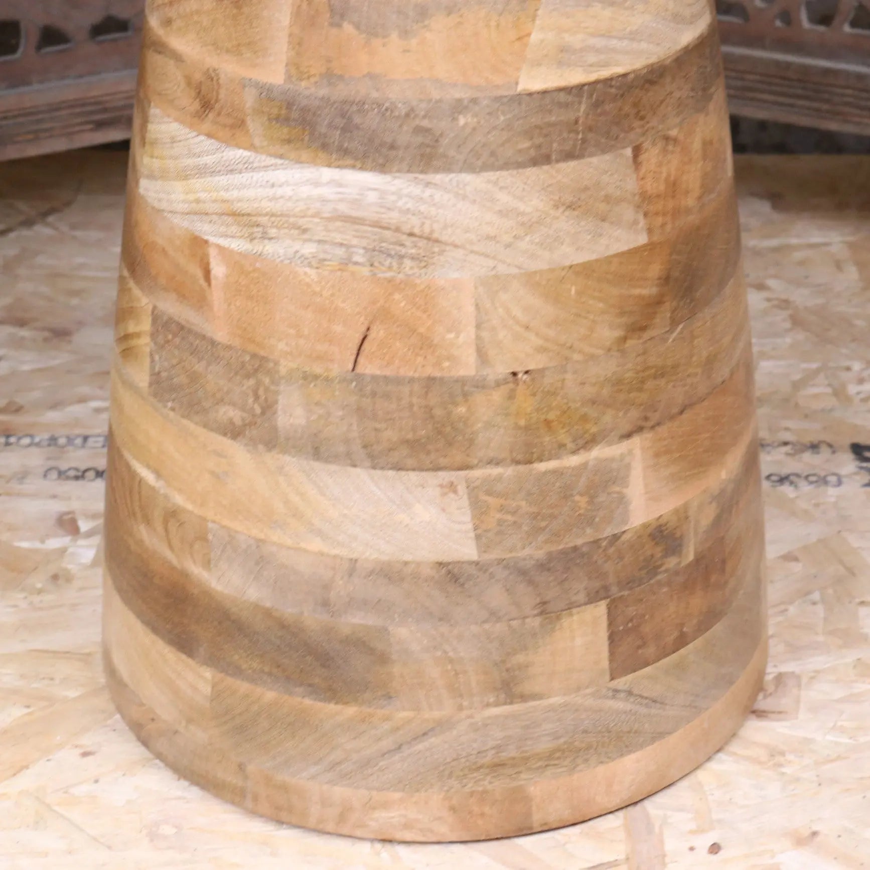 Niva large side table with cone-shaped pedestal base made of warm beige and brown mango wood planks