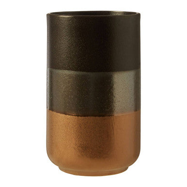 A sleek nixon stoneware vase with a gradient finish from matte black dark brown to metallic copper bottom
