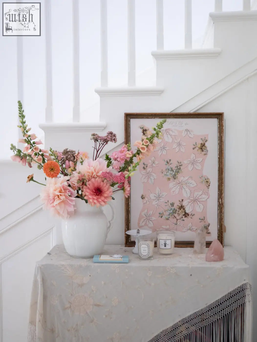 A white ceramic vase with a lush pink peach and orange flower arrangement for spring romance prints