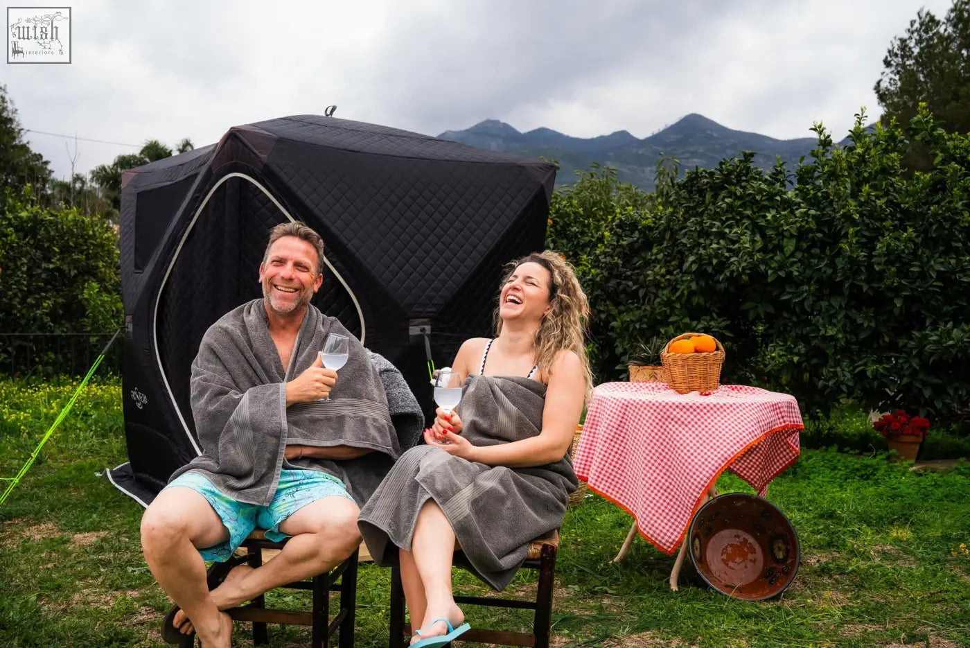 Black quilted pop-up second tent with white trim part of the r14s safety pack finsteam sauna suite