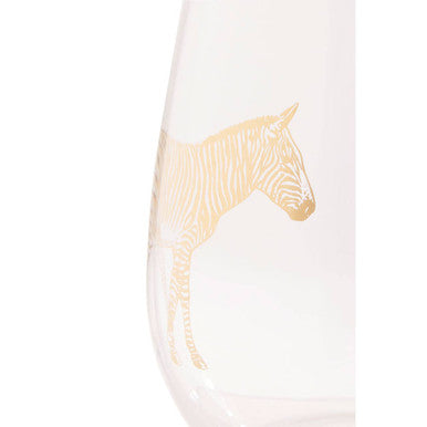 A translucent white wine glass with a delicate gold zebra silhouette etched on the side from nomi gold zebra curved tumbler