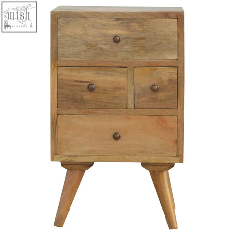 Light wood bedside table with three drawers and round brass knobs made from solid mango wood in nordic style