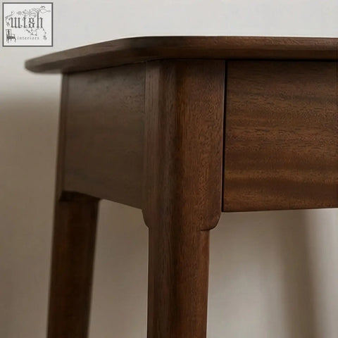Dark brown norway walnut bedside table with smooth polished finish and clean lines made from solid white cedar