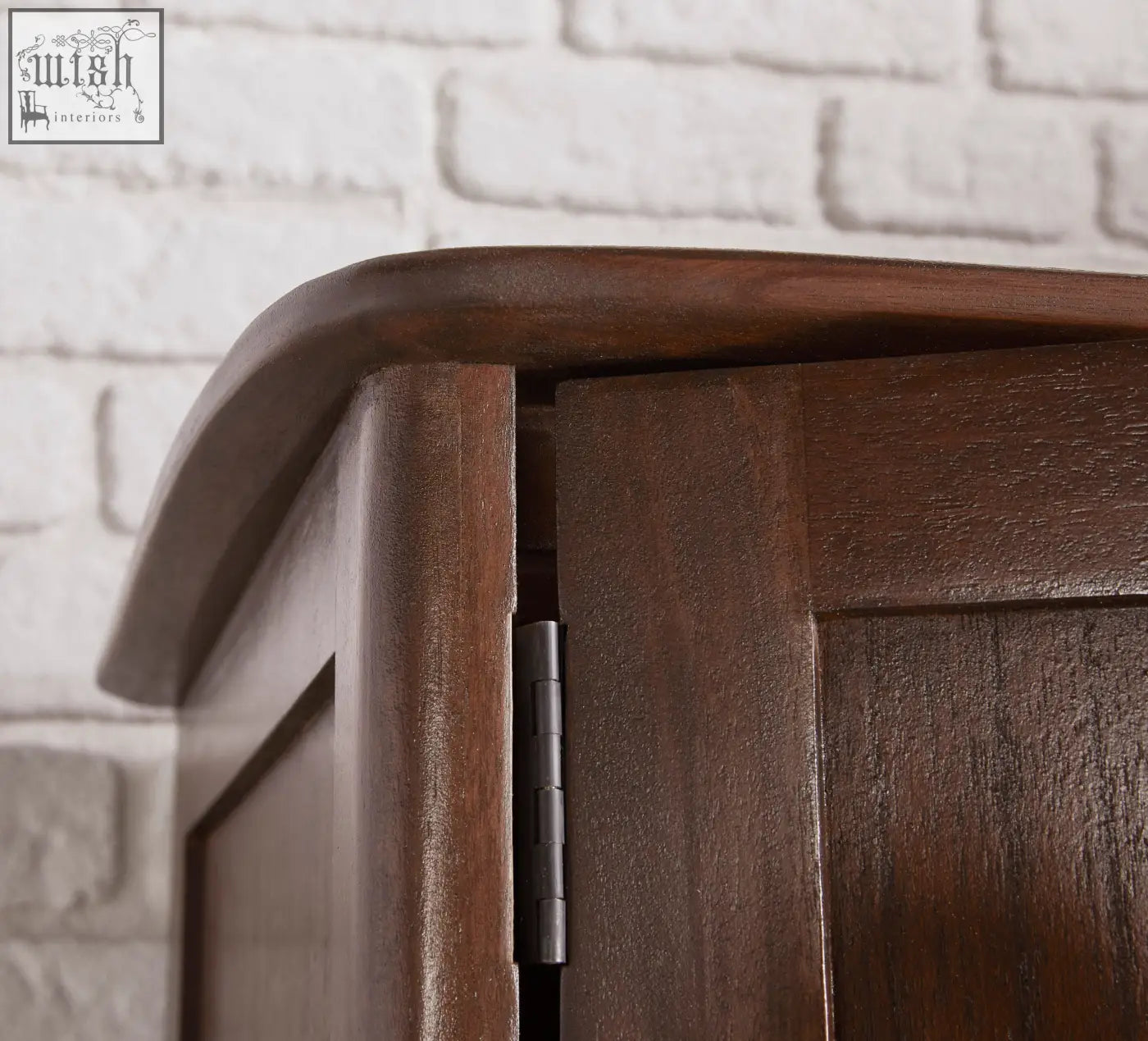 Dark brown norway walnut wardrobe with curved top edge and metal hinge made from white cedar wood