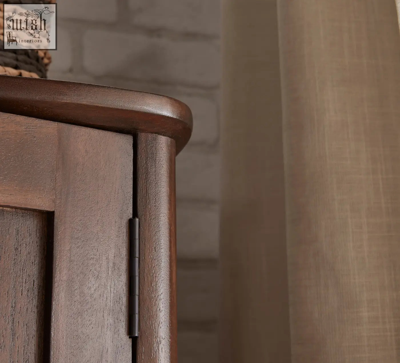 Dark brown norway walnut wardrobe with curved top edge and visible wood grain highlighting white cedar wood accents
