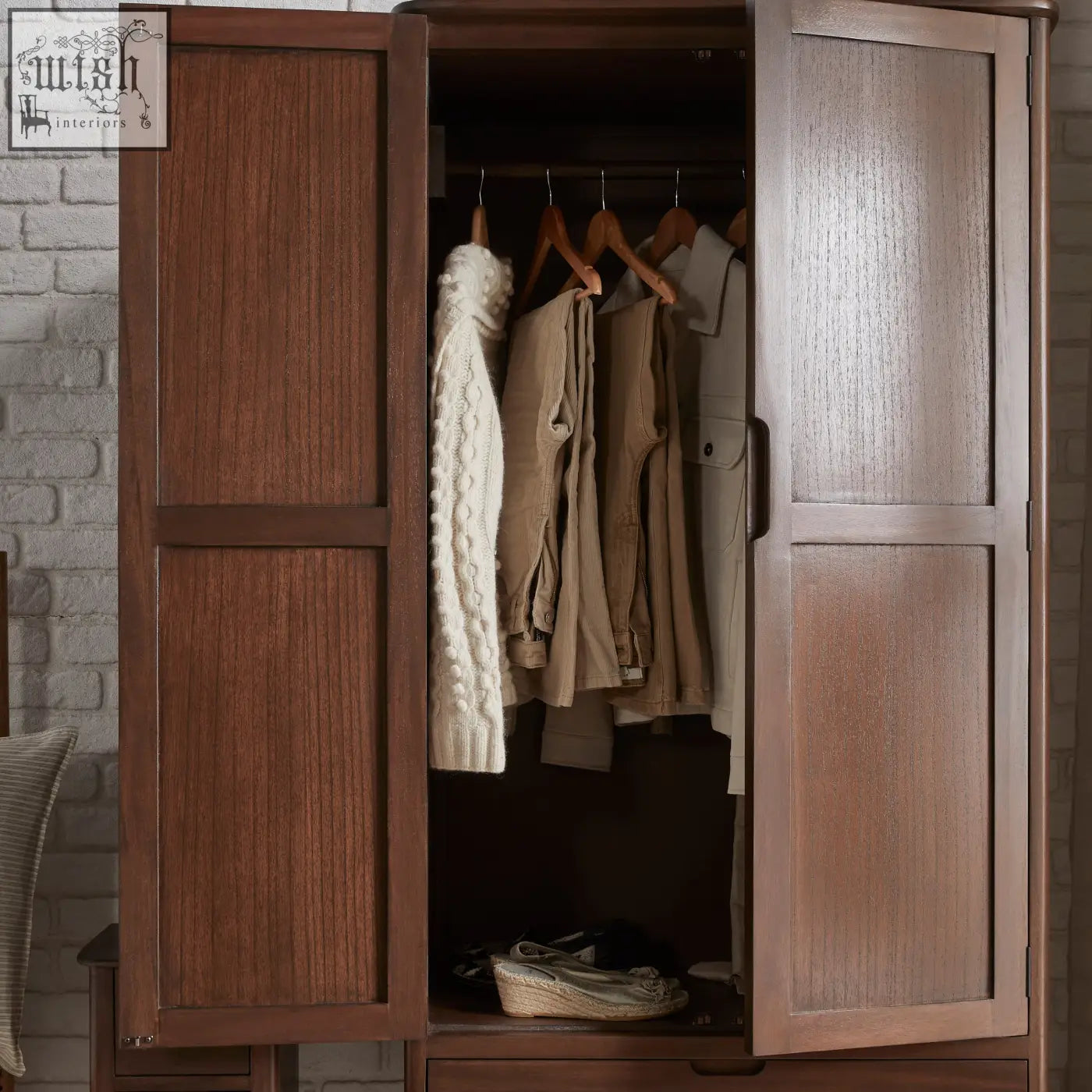 A warm brown norway walnut wardrobe with two doors featuring vertical panels and subtle white cedar wood grain texture