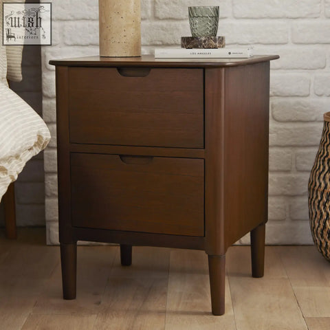 Dark brown norway walnut wooden bedside table with two drawers and tapered legs from wooden furniture collection