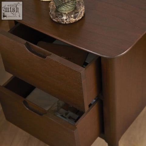Dark brown norway walnut wooden bedside table with two drawers and curved edges from wooden furniture collection