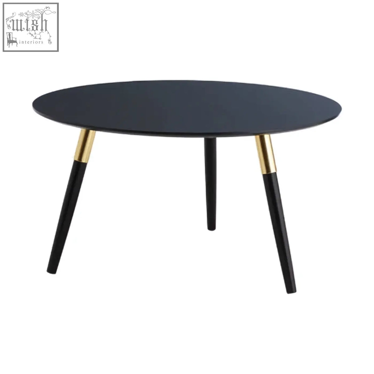 Black nostra coffee table with oval top and sleek tapered legs featuring gold metal caps