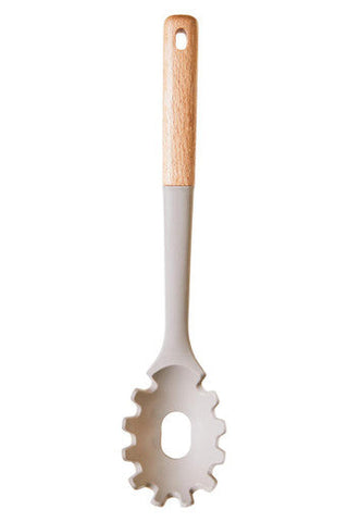 A sleek stone grey silicone head spaghetti spoon with a natural wood handle and gear-like design