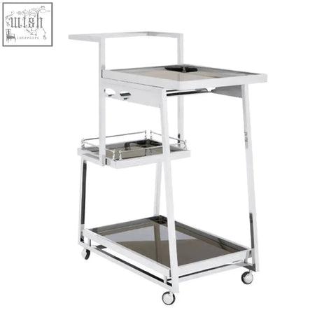 Novo 3 tier silver finish trolley with chrome finish, three glass shelves, and four caster wheels for easy mobility