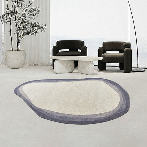 Cream nulaa fractal wool rug with soft plush texture and organic shape framed by muted purple bands