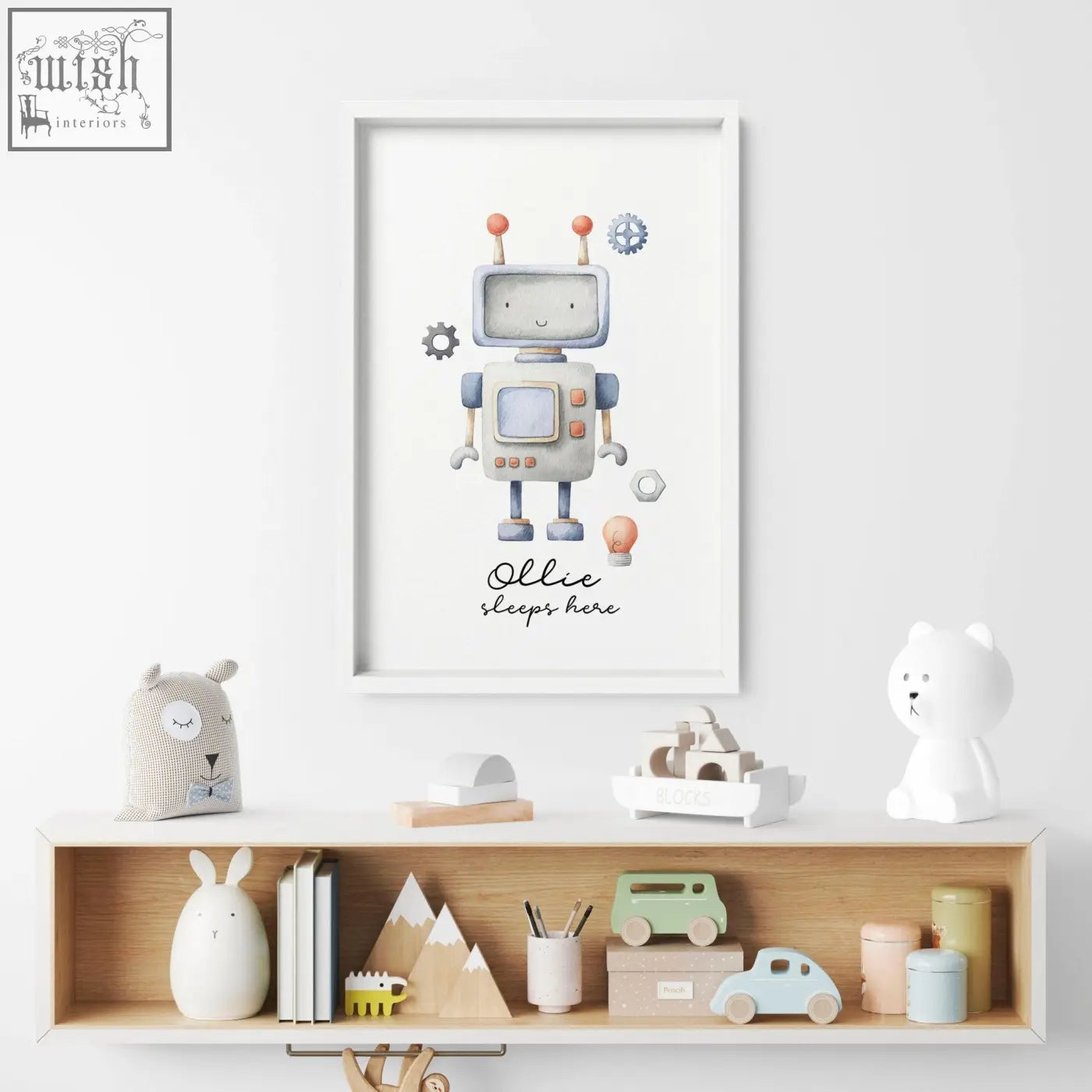 A charming nursery room decor wall art print of a friendly robot with orange antennae and blue accents in white frame
