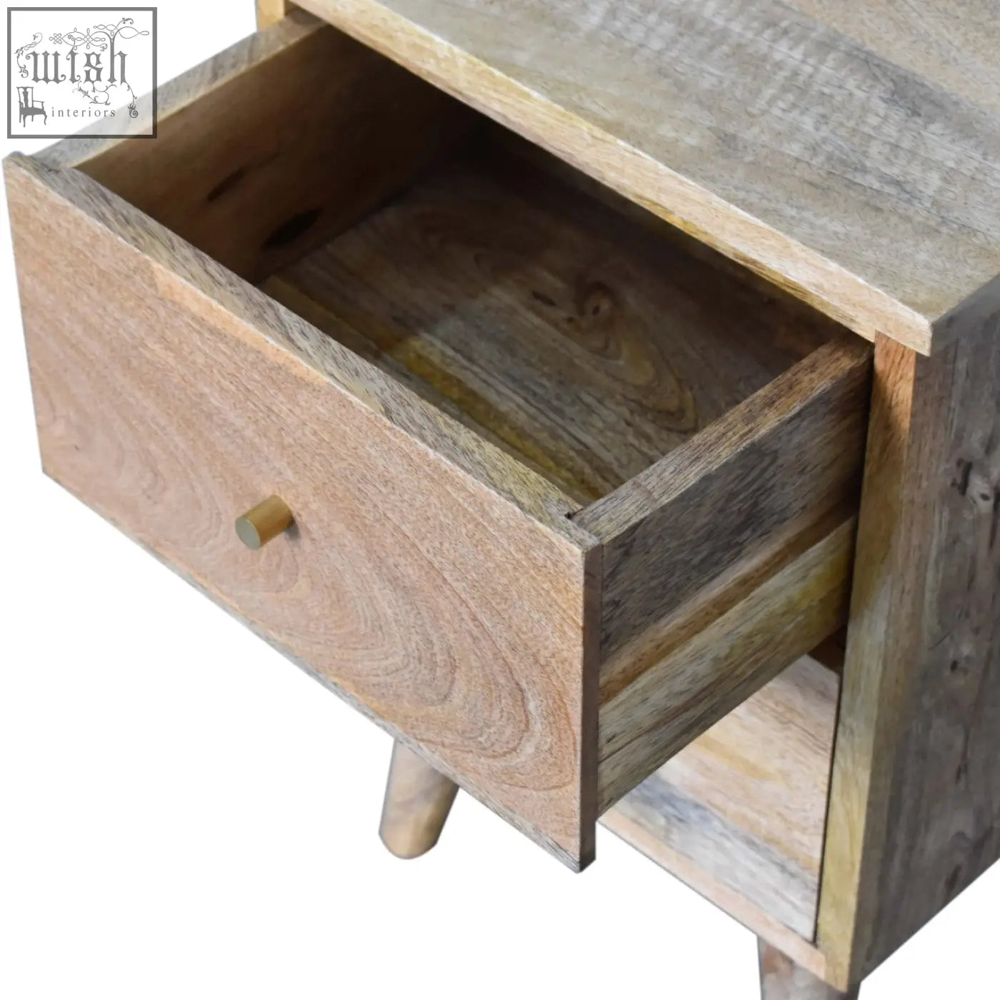 Oak ish bedside table with a rustic wooden drawer and nordic style legs in light brown natural wood tones
