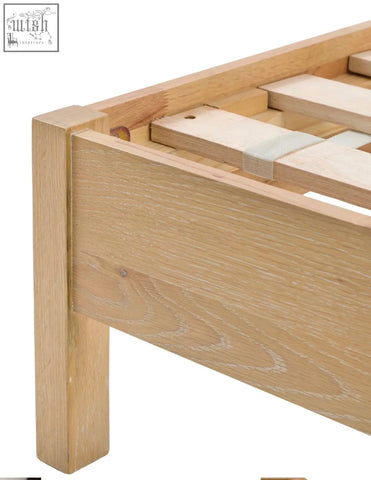Light oak oakham double bed frame with clean minimalist design and visible oak solids grain