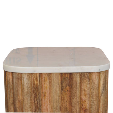 A rectangular wooden side table with a smooth light-colored marble top from oakish solid mango wood
