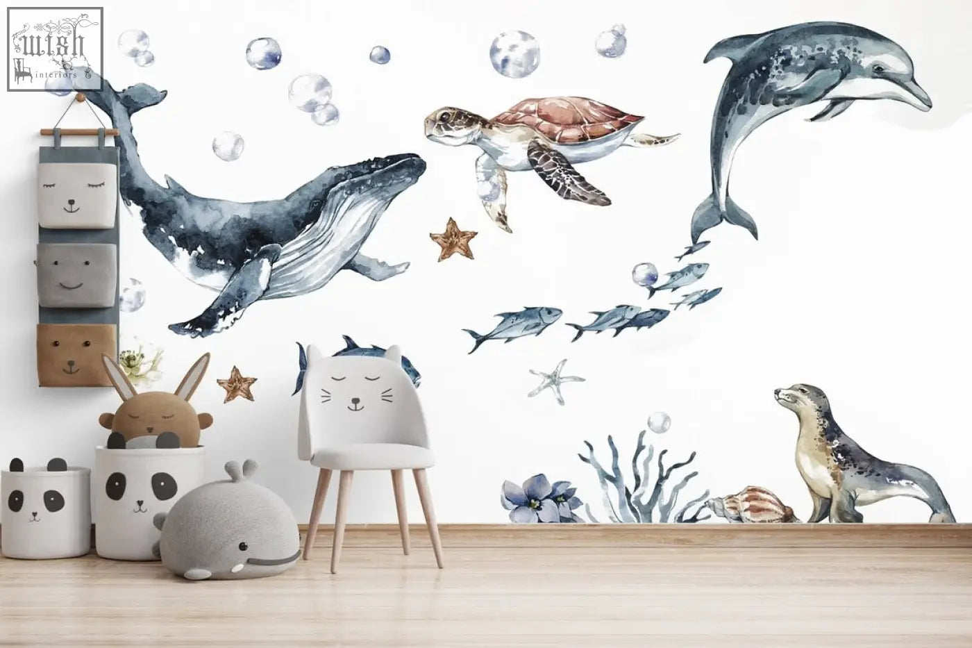 Watercolor ocean animals wall decal set featuring whale dolphin turtle and fish in blue gray and brown for kids rooms