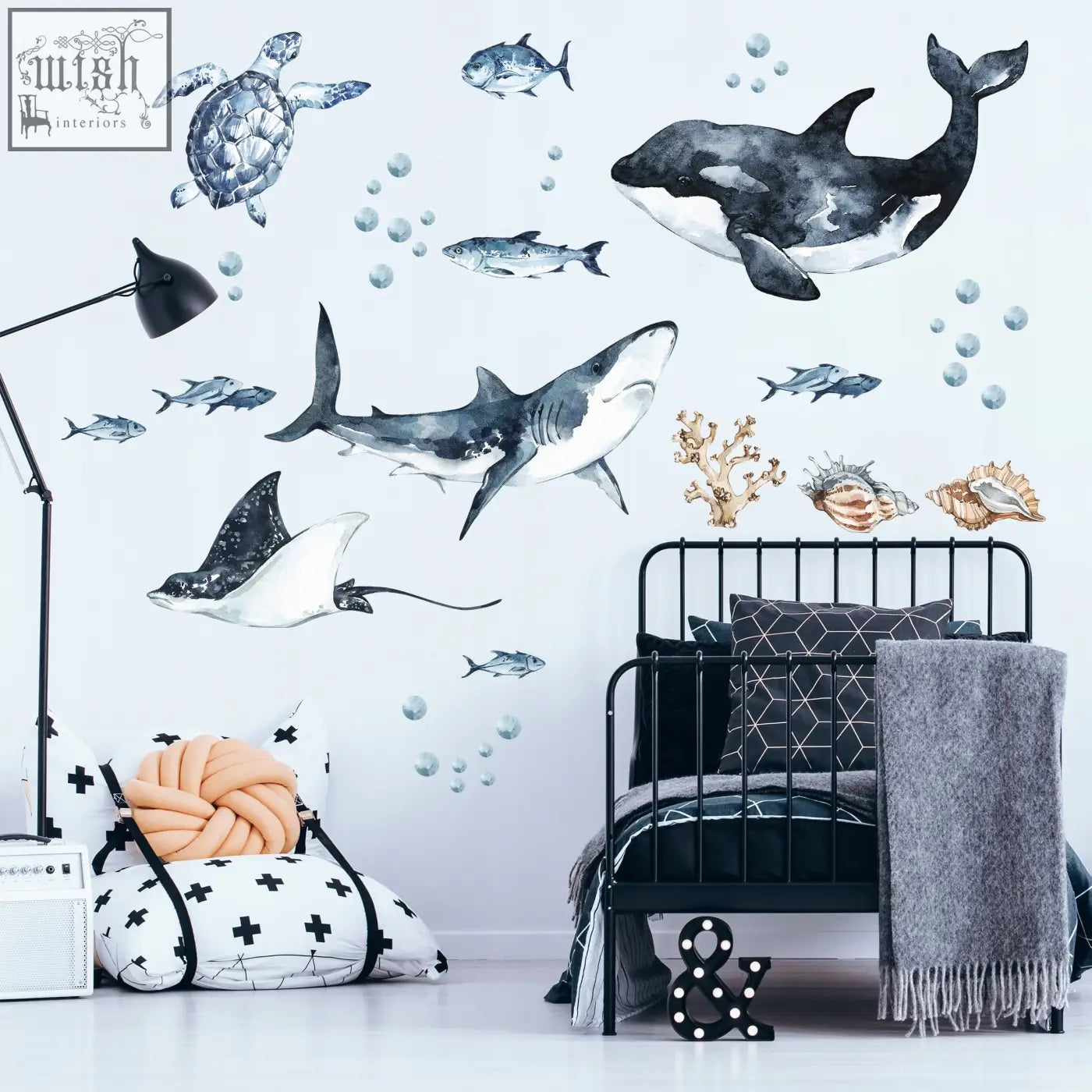 Watercolor ocean animal wall decals featuring a black and white orca great white shark turtles rays and coral stickers