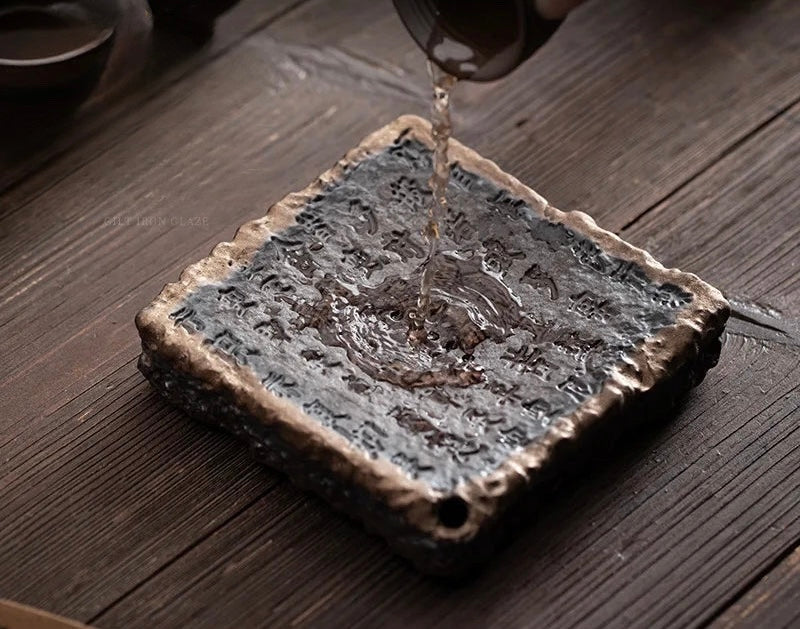 Dark textured ceramic ocha set tea tray with raised chinese characters and rustic handcrafted finish