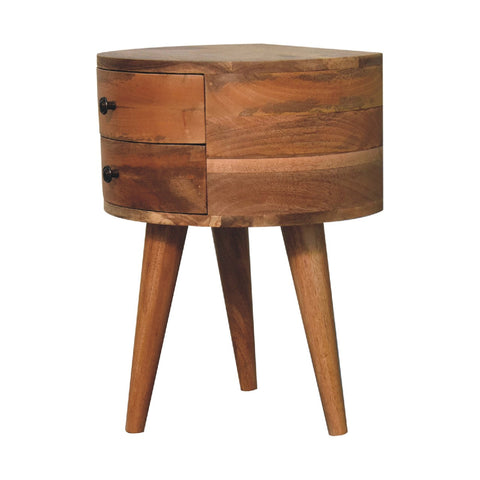 A rustic odyssey oak-ish tripod bedside table with two drawers and tapered legs in warm brown mango wood finish