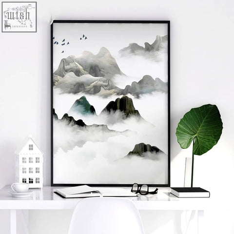 Black-framed minimalist mountain landscape wall art print with misty grayscale peaks and teal accents for office decor ideas