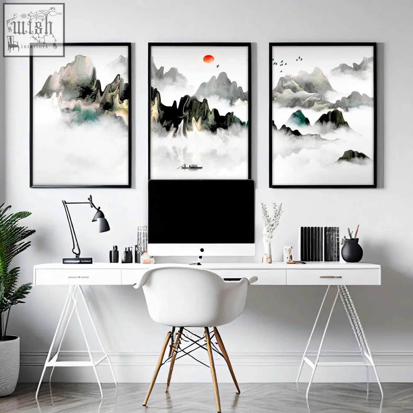 White minimalist desk with sleek metal legs and multiple drawers paired with wall art prints for office decor ideas