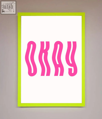 Okay framed poster with bold wavy pink lettering on white background and bright lime green border