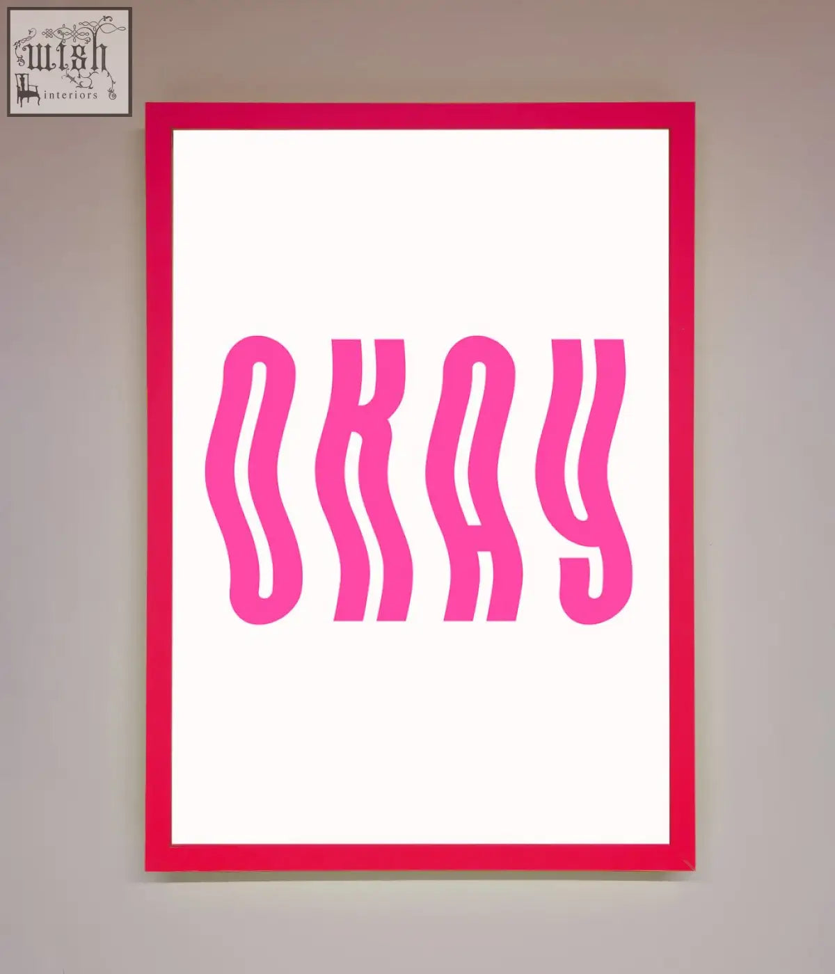 A vibrant pink framed poster with bold wavy magenta okay lettering on a clean white background perfect for decor