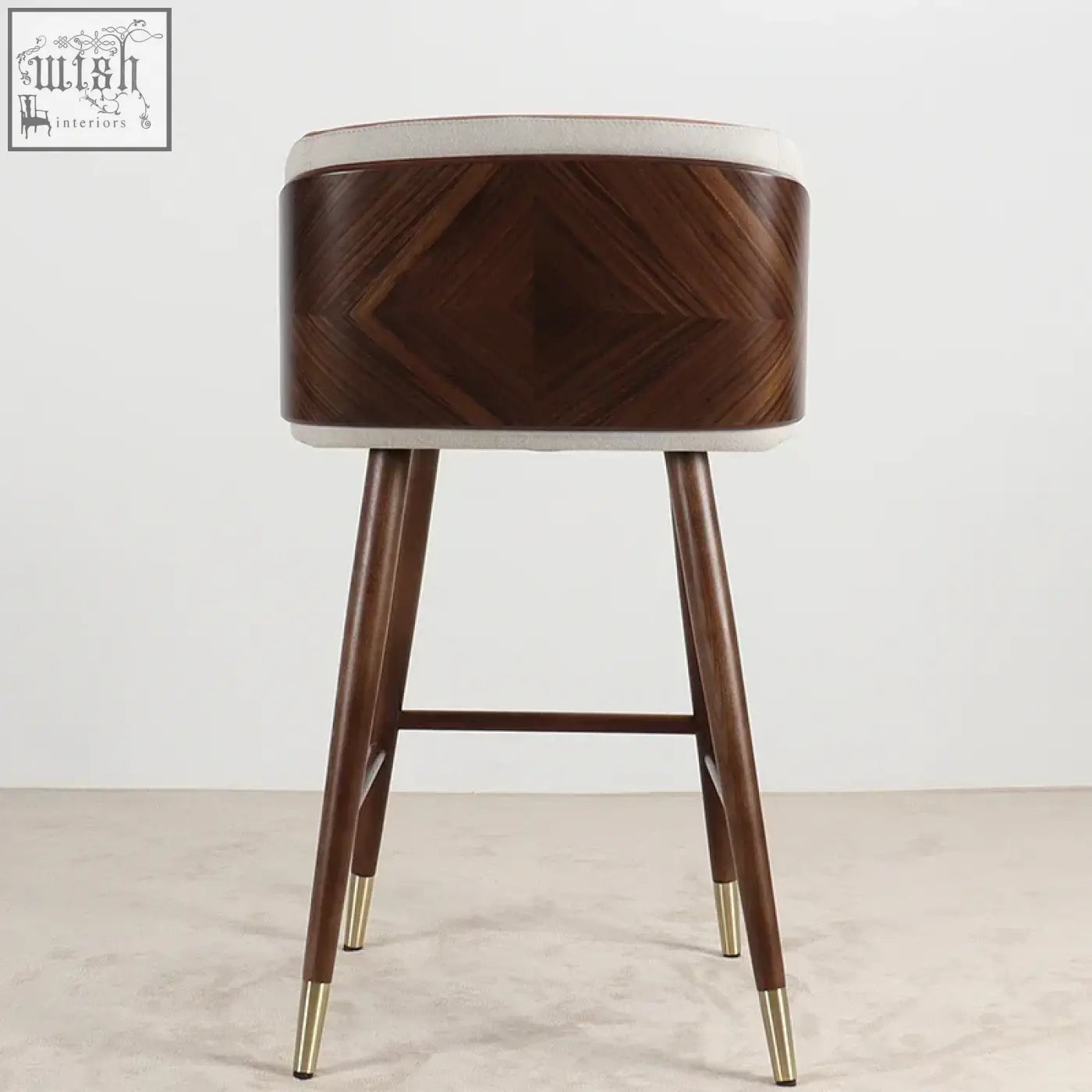 Okazaki bar stool with dark wood chevron seat, white upholstered top and legs, and gold-tone caps for stylish seating