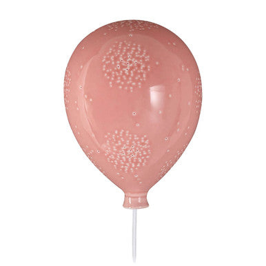 A glossy kids pink balloon ceramic wall night light with raised dot and circle patterns for kids room decor