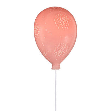 A soft pink kids pink balloon ceramic wall night light with a textured dotted pattern for bedroom decor