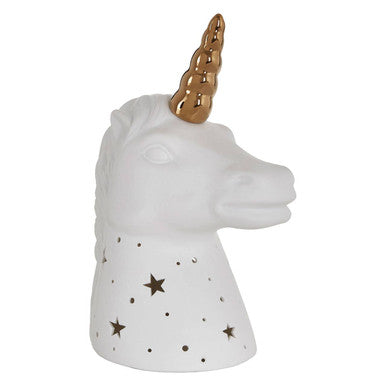 Ola kids unicorn ceramic night light in white with gold horn and star-patterned base for a cozy glow