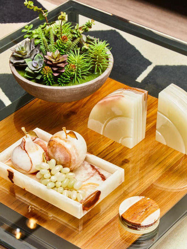 Creamy white and warm brown veined oleena onyx decorative pear bookends with smooth polished finish