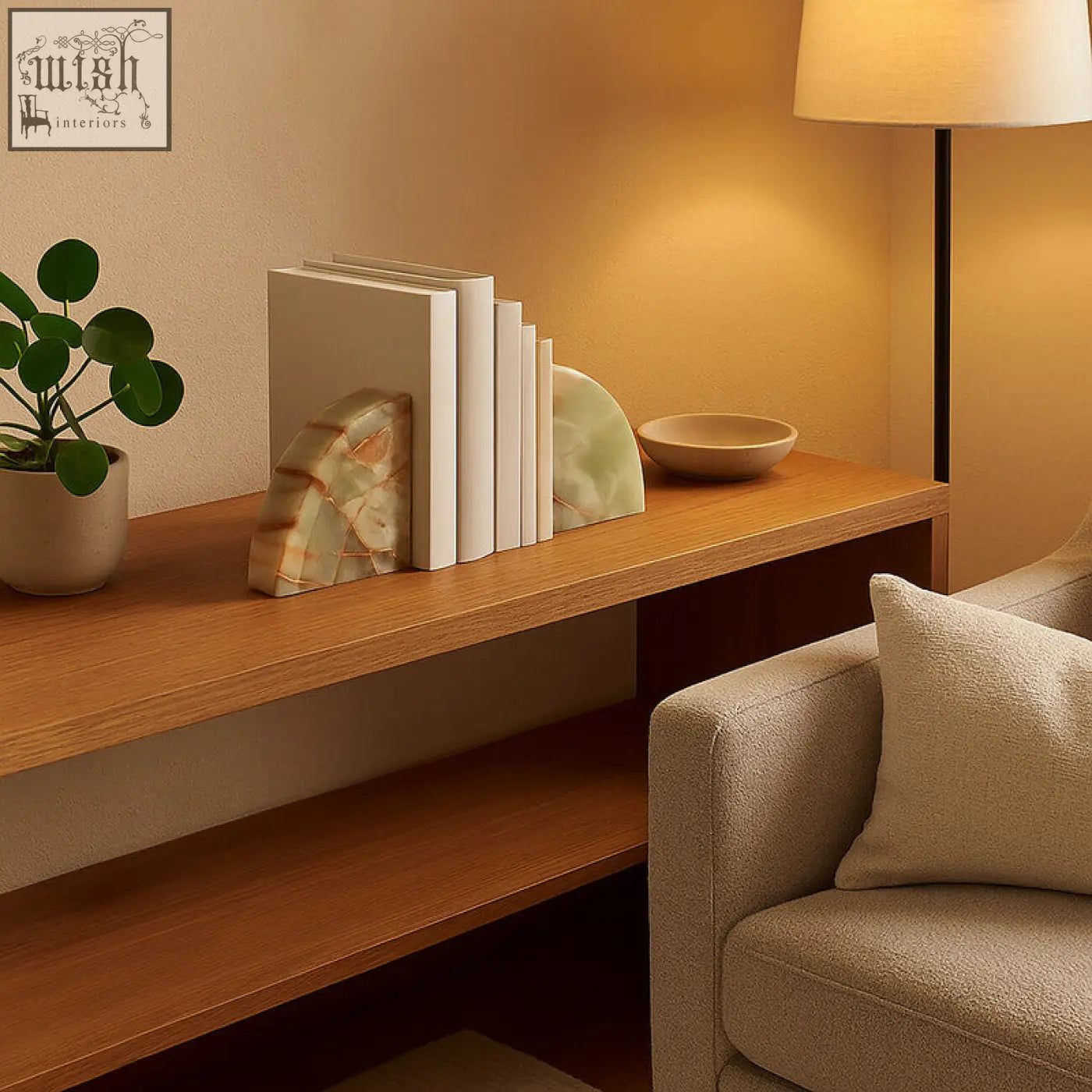 Creamy green and beige marble two onyx bookends with natural veined texture from the oleena set for stylish bookshelf use