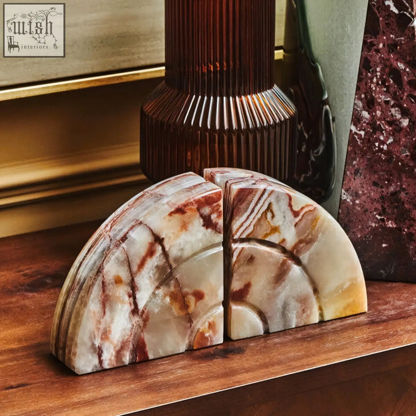 A pair of oleena set two onyx bookends with polished cream brown and amber swirls perfect for stylish shelving