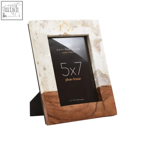 A stylish large photo frame with white marble top and warm brown acacia wood base perfect for a large photo