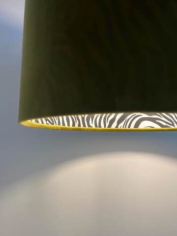 Olive green velvet drum lampshade with zebra-print cotton interior and gold trim handmade ceiling light shade uk