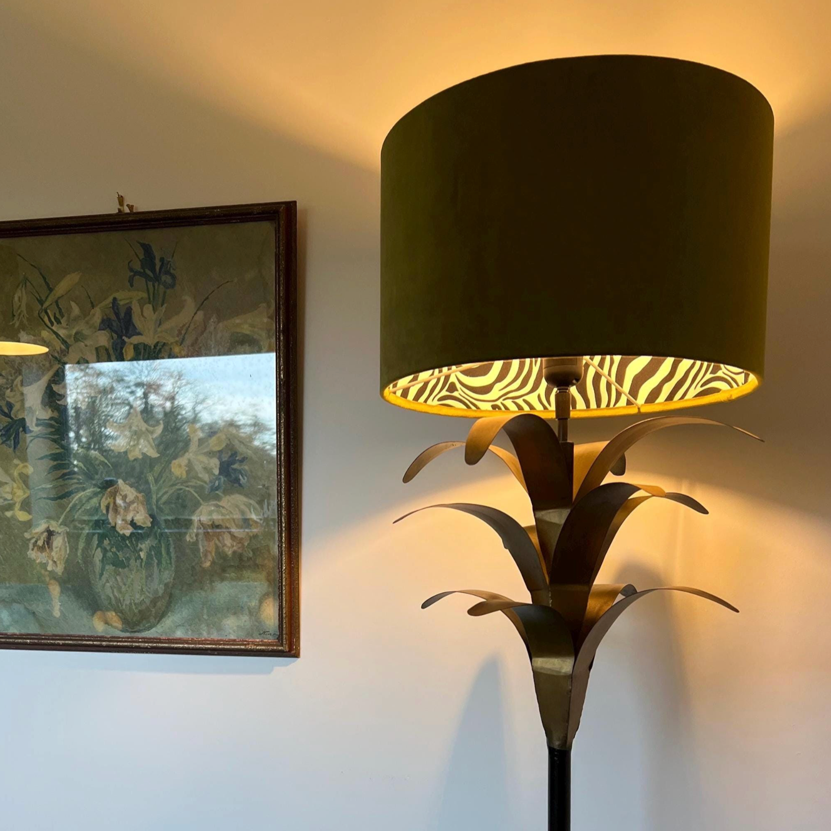 Olive green velvet drum lampshade with zebra cotton interior and leaf-shaped brass base for ceiling light use
